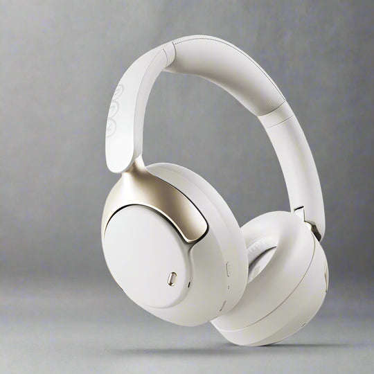 Over-ear wireless headphones in black color with a noise-cancellation feature, shown with a detachable cable and a 3.5 mm jack.