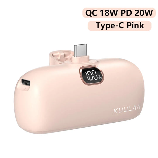 Pink power bank with digital display and USB-C port on a white background