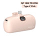 Pink power bank with digital display and USB-C port on a white background