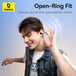 Person wearing open-ring fit earphones with Baseus logo and text on a light blue background