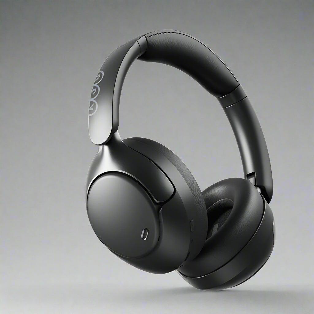 Over-ear wireless headphones in black color with a noise-cancellation feature, shown with a detachable cable and a 3.5 mm jack.