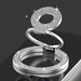 Silver ring holder with gemstone accents on a black background